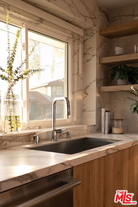 kitchen with dishwasher and sink