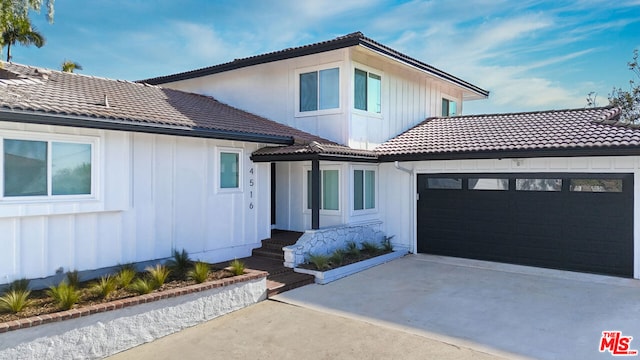 view of front of home with a garage