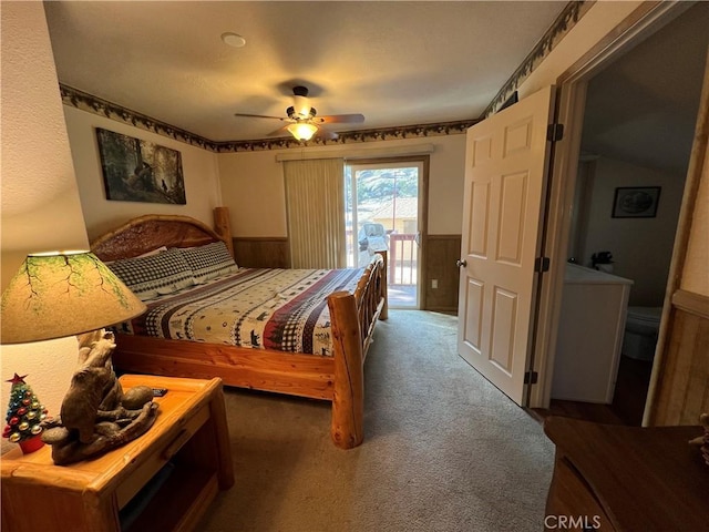 bedroom featuring ceiling fan, access to exterior, and carpet floors