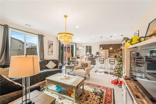 living room featuring a notable chandelier