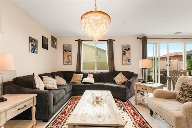 living room with a notable chandelier