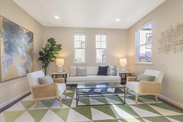 living room with light hardwood / wood-style floors