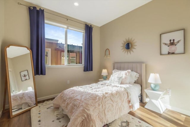 bedroom featuring wood-type flooring