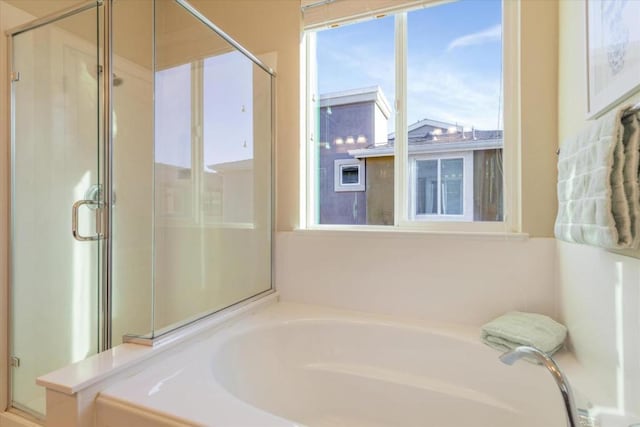 bathroom with independent shower and bath