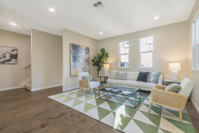 living room featuring dark hardwood / wood-style floors