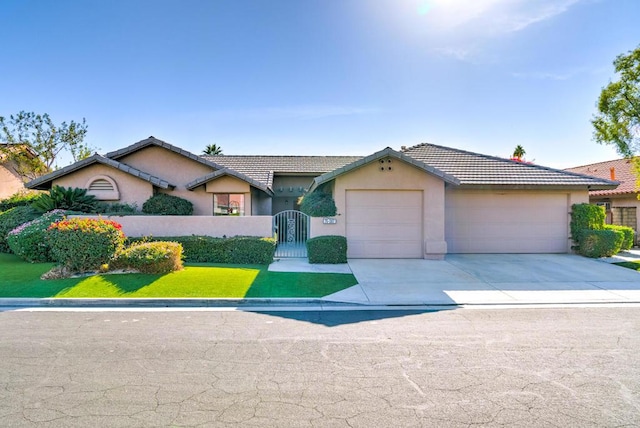 single story home with a garage