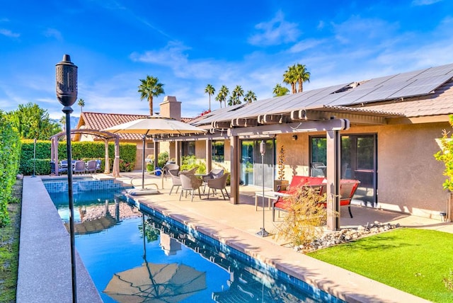 view of pool featuring a patio