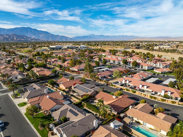 drone / aerial view featuring a mountain view