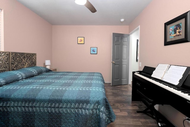 bedroom featuring ceiling fan and dark wood-type flooring