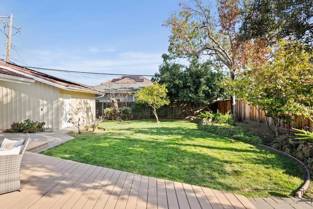 view of yard with a wooden deck