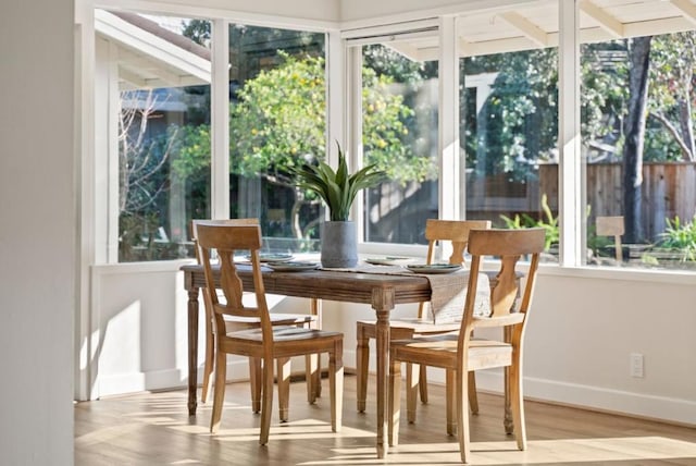 sunroom / solarium featuring plenty of natural light