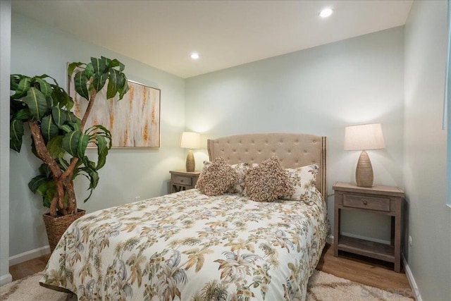 bedroom with light wood-type flooring