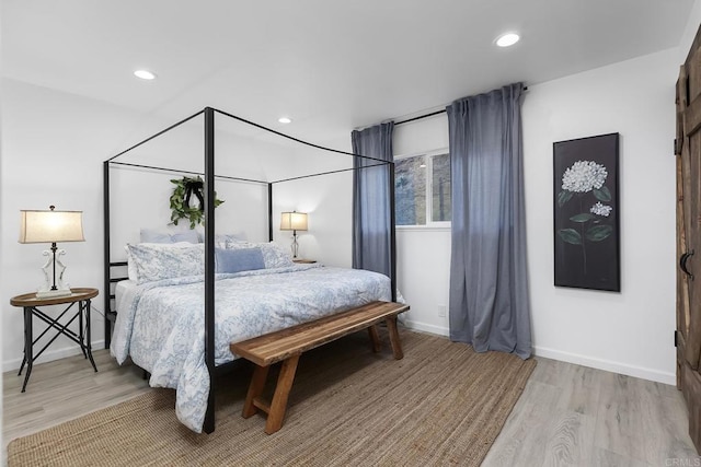 bedroom featuring light hardwood / wood-style flooring