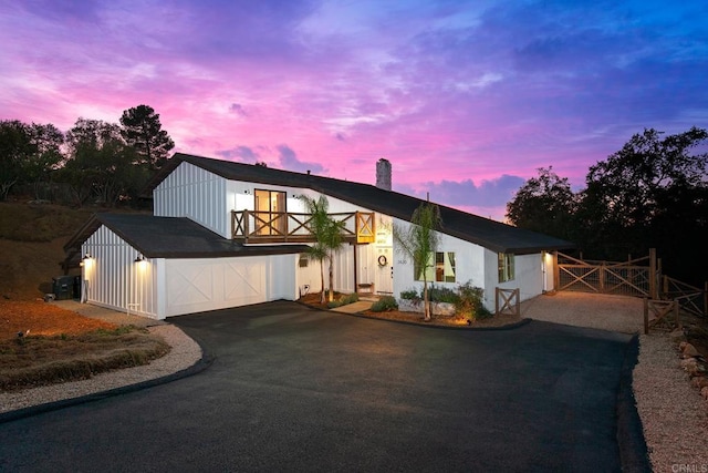 view of front of property with a garage