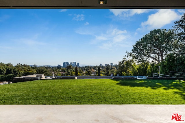 view of home's community with a lawn