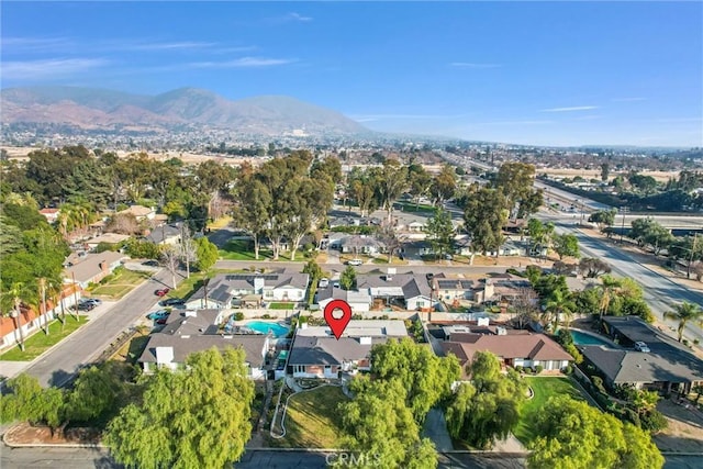 drone / aerial view featuring a mountain view and a residential view