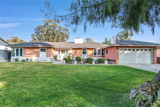 ranch-style house with a garage and a front yard