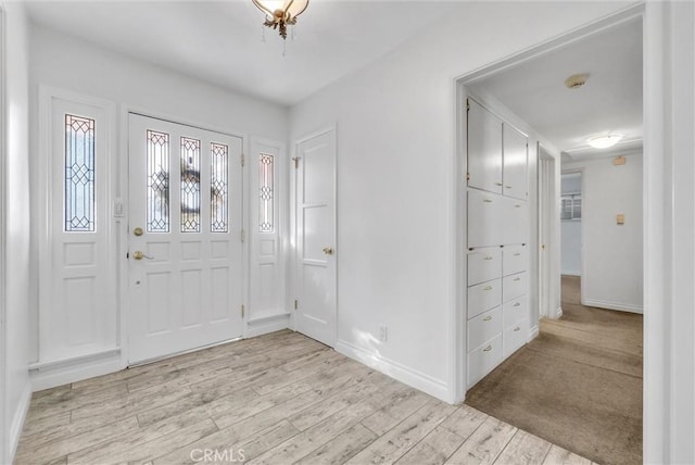 entrance foyer featuring light hardwood / wood-style flooring