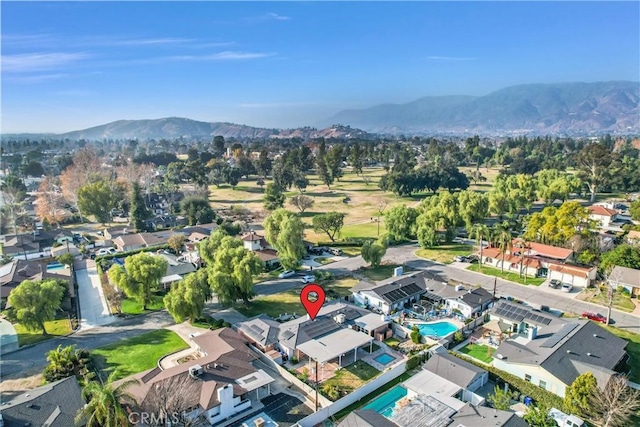 bird's eye view featuring a residential view and a mountain view