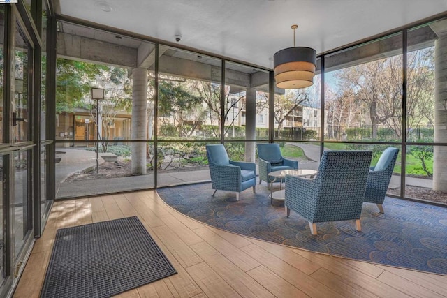 unfurnished sunroom with plenty of natural light