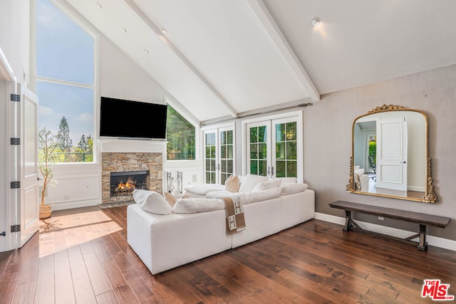 living room featuring high vaulted ceiling, dark hardwood / wood-style flooring, beamed ceiling, and a fireplace