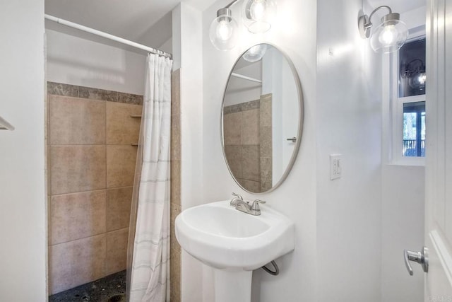 bathroom featuring a shower with curtain