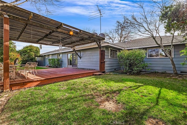 view of yard with a pergola and a deck