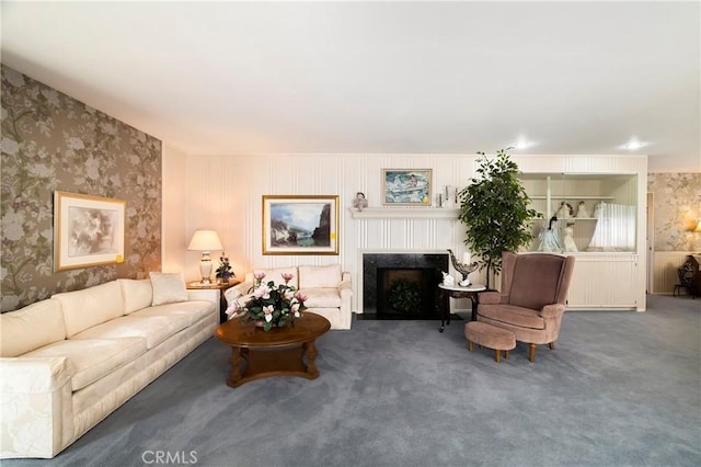 carpeted living room with a fireplace