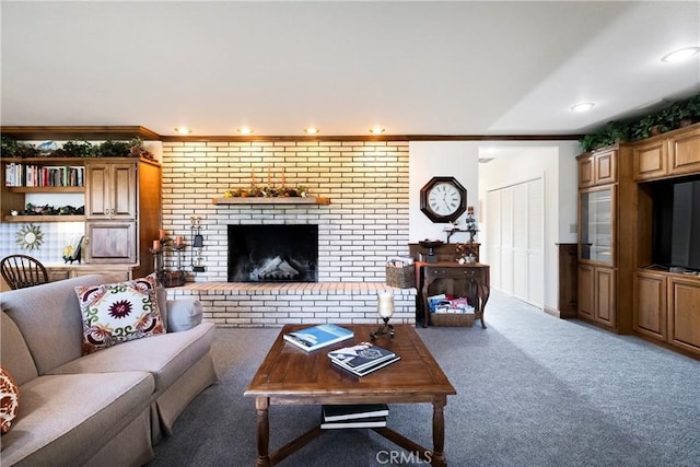 living room featuring a fireplace, ornamental molding, and carpet flooring