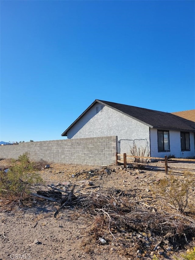 1217 Lill Hill Dr, Needles, CA 92363 - view of property exterior featuring stucco siding