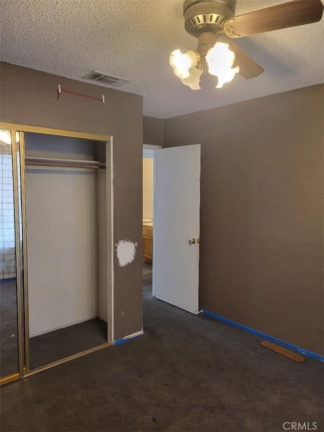 1217 Lill Hill Dr, Needles, CA 92363 - unfurnished bedroom with a closet, carpet floors, a textured ceiling, and a ceiling fan