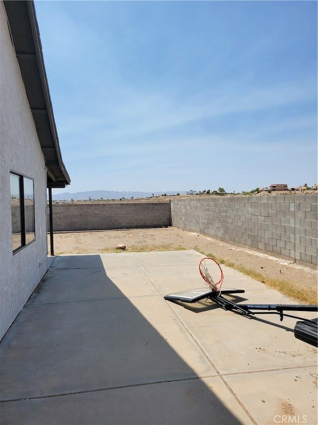 1217 Lill Hill Dr, Needles, CA 92363 - fenced backyard with a patio area