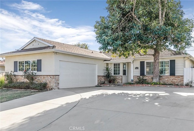 ranch-style house featuring a garage