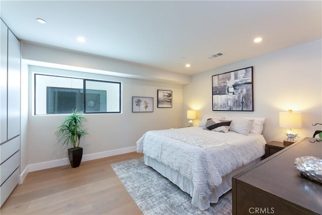 bedroom featuring light hardwood / wood-style floors