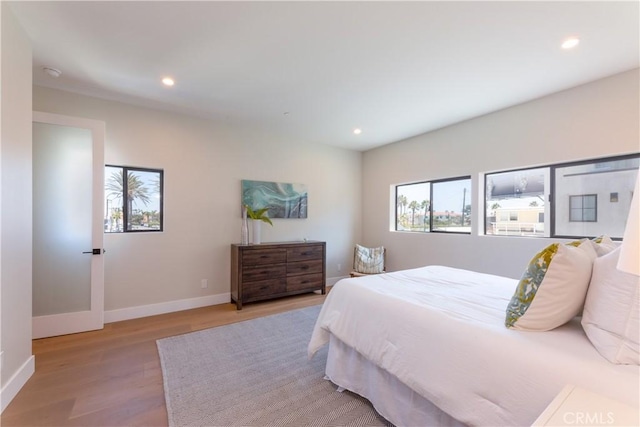 bedroom featuring light wood-type flooring