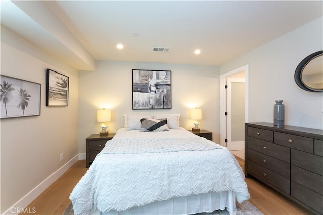 bedroom featuring light hardwood / wood-style flooring