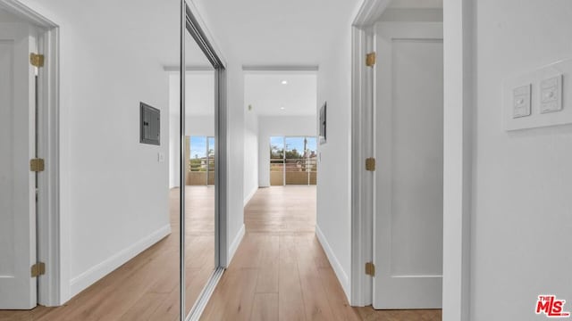 corridor featuring light hardwood / wood-style flooring