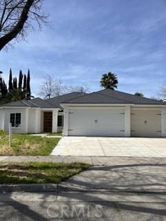 single story home with a garage