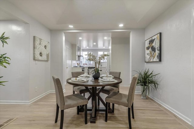 dining room featuring light hardwood / wood-style flooring