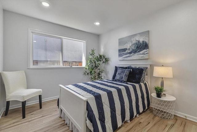 bedroom featuring light hardwood / wood-style flooring