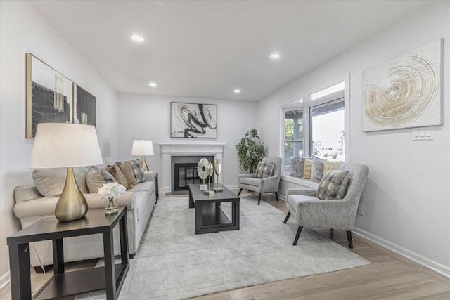 living room with light hardwood / wood-style flooring