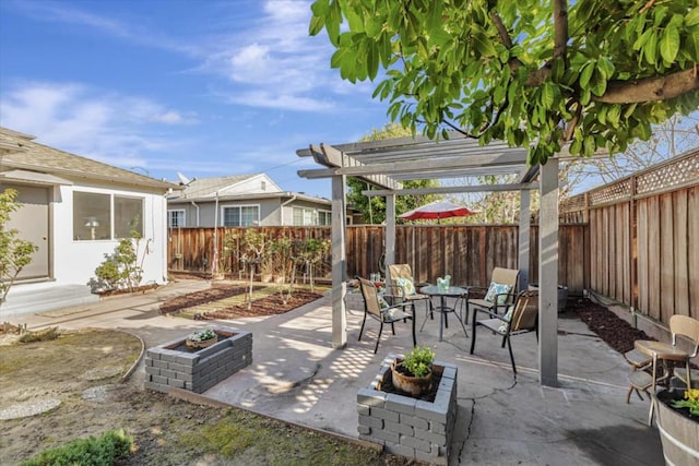 view of patio / terrace featuring a pergola