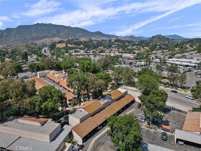 drone / aerial view featuring a mountain view