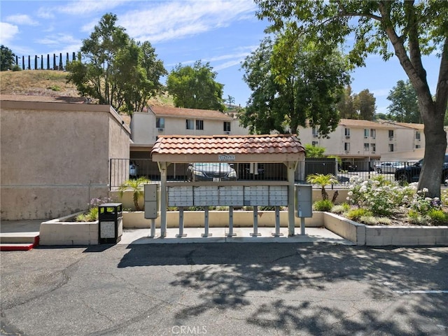 view of home's community featuring a mail area