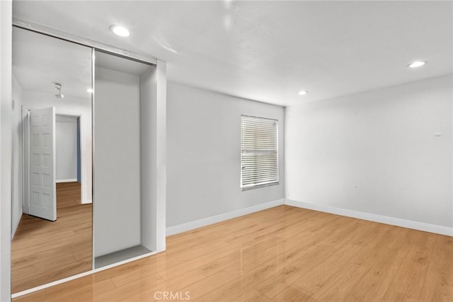 empty room featuring light hardwood / wood-style flooring