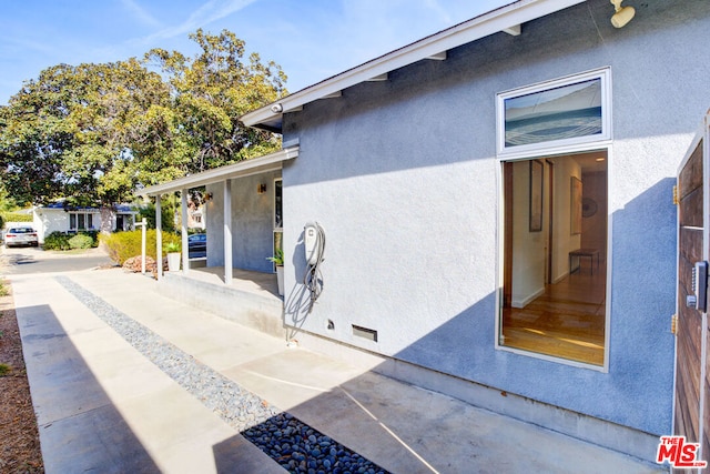 view of home's exterior featuring a patio area