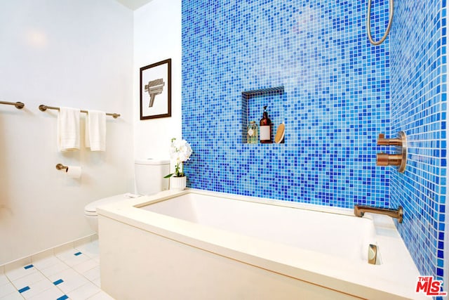 bathroom with separate shower and tub, tile patterned floors, and toilet