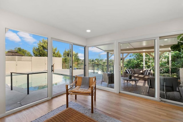 sunroom / solarium with a healthy amount of sunlight