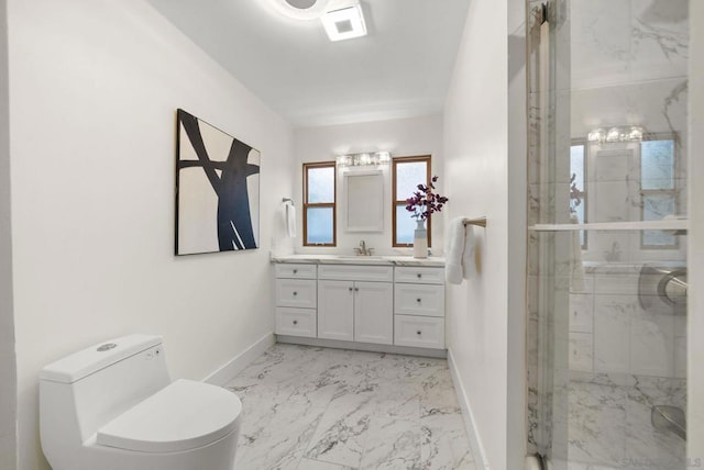 bathroom featuring an enclosed shower, vanity, and toilet