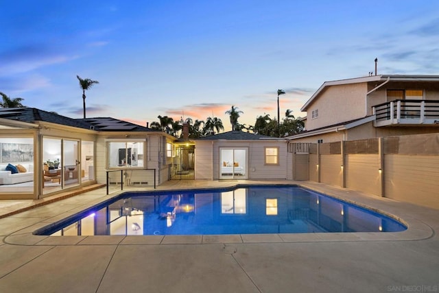 view of swimming pool with a patio